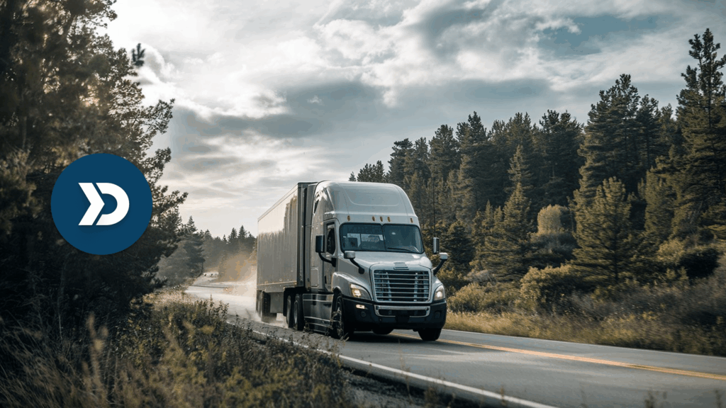 Semi-truck driving through forest road, symbolizing eco-friendly fleet operations and carbon scoring with mobile telematics.